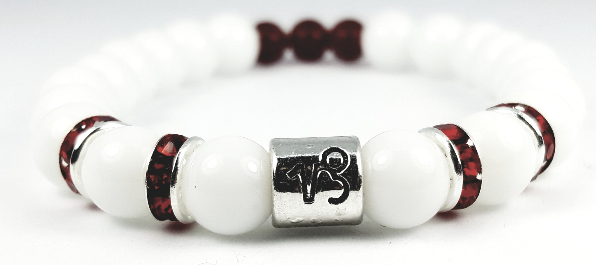 capricorn's garnet white onyx bracelet by zodiac bling