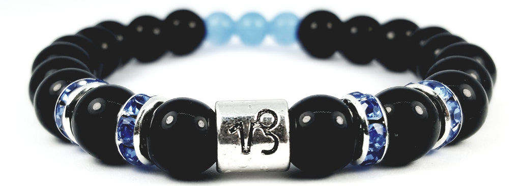 capricorn's blue topaz black onyx bracelet by zodiac bling