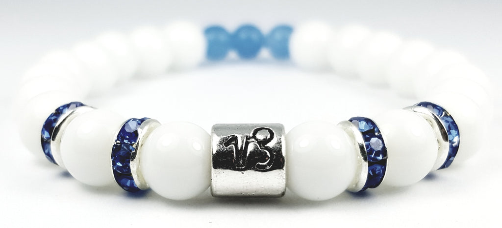 capricorn's blue topaz white onyx bracelet by zodiac bling